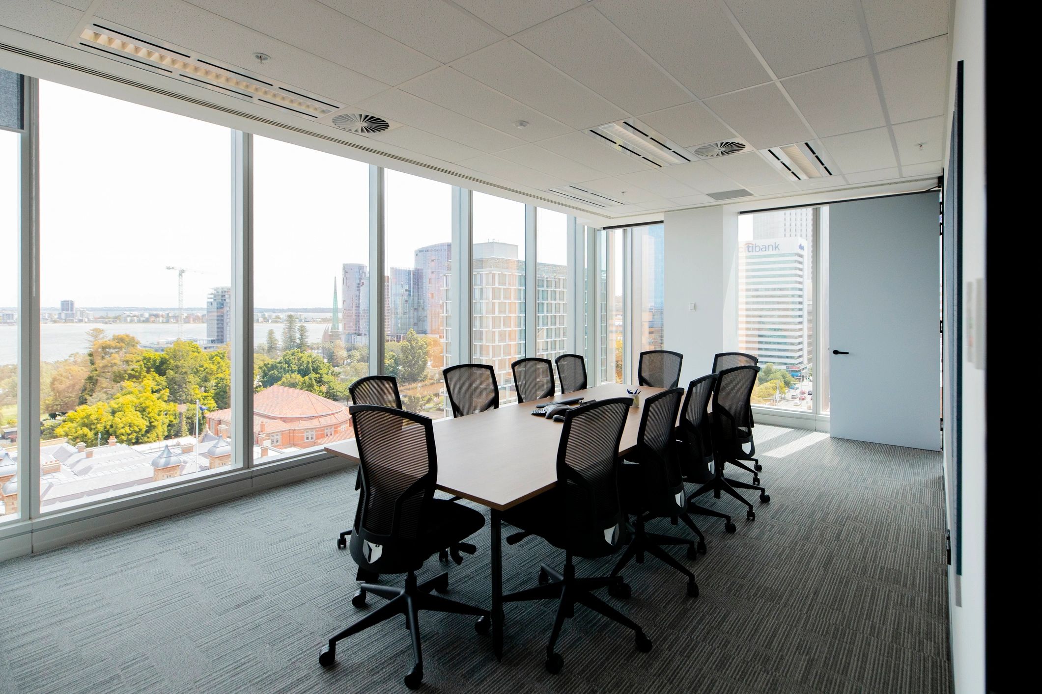 Professional boardroom with city views